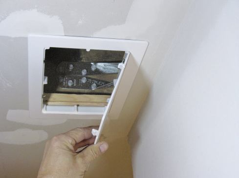 If you need access to install a lateral-support bracket to a house joist above a finished ceiling, using a hinged plastic panel (usually available in a supplier’s plumbing department) is a quick way to cover a hole in the drywall. The panels snap into place and don’t require any blocking for mounting.