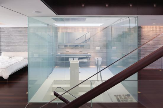2012 Bath/Merit: 73rd Street Penthouse, New York, by Turett Collaborative Architects, New York   Located beneath a large skylight, this glass-box master bath serves as a natural lighting fixture.