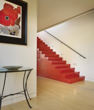 While the stair’s form derives from a Japanese archetype, its red lacquer finish speaks of China.