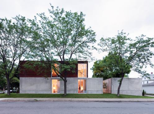 The B+W House, designed by Julie Snow Architects, occupies a corner lot in a single-family neighborhood of Minneapolis. 