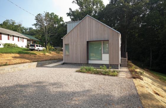 The modular home is made from two modules with a marriage line running vertically from the peak of the gable.