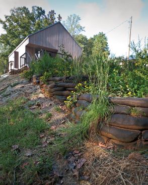 Planted terrace beds work with the existing topography to treat grey water and manage stormwater on site.