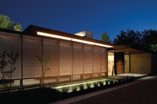 More than 200 unique 4-foot-by-10-foot cold-rolled steel panels are affixed to the exterior. Each has a unique perforation pattern to modulate light, transparency, and views.  
