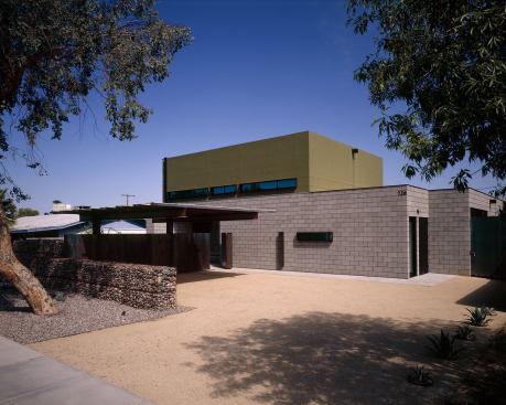 Nearly solid walls face the street and the southwest elevation on this new house designed and built by 180 Degrees. 