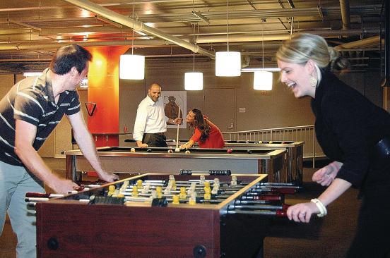 Foosball and pool tables became one gathering spot for 565 Quincy’s residents.