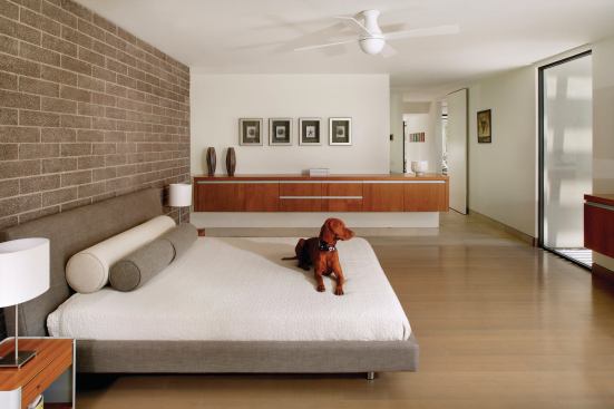 Trahan and crew also fabricated these floating cabinets, which keep the floor plan open and make the rooms look more spacious. 