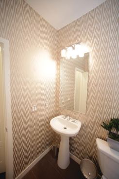 Even the powder room got a blast-from-the-past wall treatment.