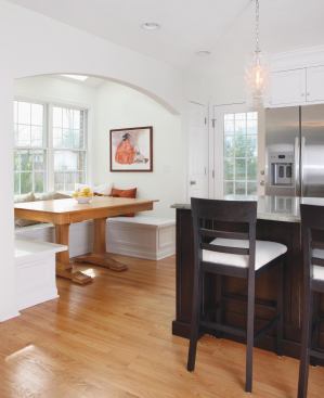 Bright Nook

A 65-square-foot addition replaces a sliding glass door. The banquette, topped by two skylights, offers a light-fififilled nook featuring additional storage.
