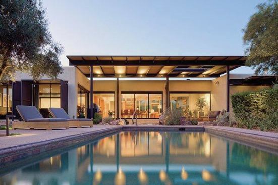 The canopy connects the home with the pool and backyard.
