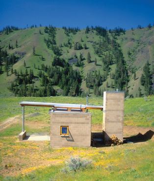The tiny, off-the-grid Marquand Retreat takes simplicity to a sublime extreme. The tower holds a cistern.