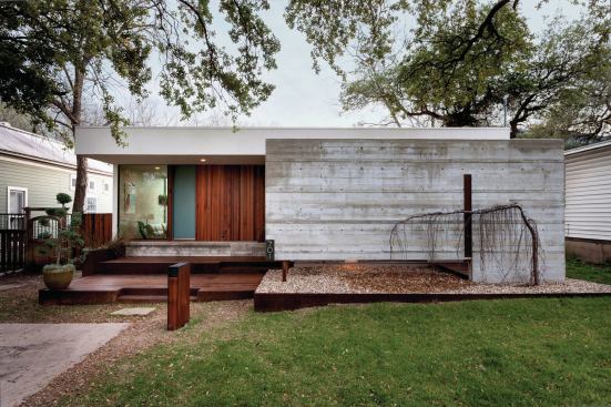 The house is on a street with other modestly-sized homes, in a neighborhood with independent stores and restaurants. 