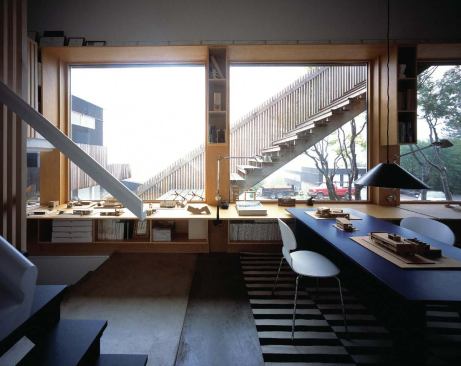 A long counter of oiled birch plywood holds models, which Salmela likes to build by hand.