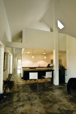 The LEED Platinum Prescott Passive House's interior flooring is concrete.