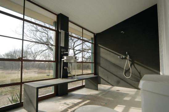 Simple forms, utilitarian components, and abundant south light lend this new bath an astringent clarity.