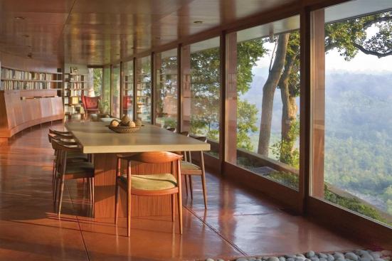 The dining room has a spectacular view of the river below and conveys a sense of prospect and refuge.


