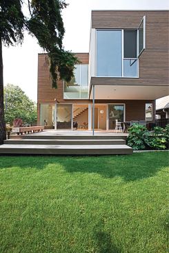 Centered on the length of the site, the plan gives each unit a private yard.