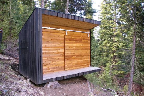 Built on a series of piers to minimize site disturbance, this off-the-grid shed is a study in simplicity and thrift.