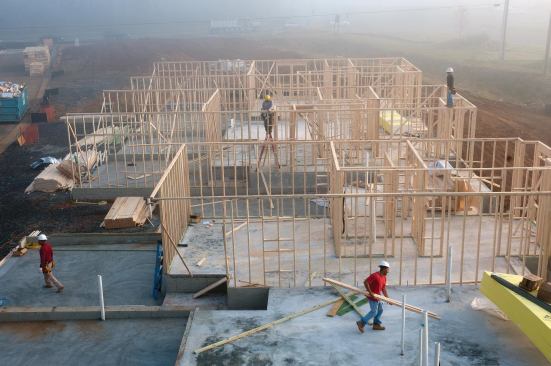 Row homes situated in a foot-friendly community and geared to move-up buyers and empty-nesters helped Miller and Smith weather tough times. Now, the company is reporting increased traffic and sales for the first quarter of 2012.