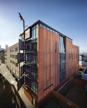 The "art doors" on the rear of the building act as owner-controlled portals for furniture and large pieces of art.