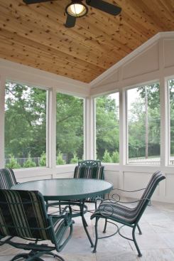 The four-square plan includes a traditional, screened-in porch.