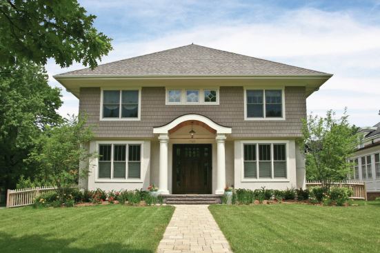 Kensington is an infill house on a leafy street in Grosse Pointe Park, Michigan. It was designed by architect Wayne Visbeen. 