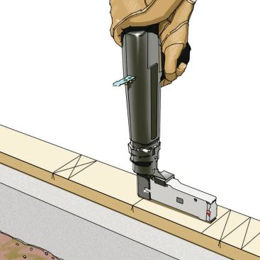 Tack It Down Frame as usual, using powder-actuated gun-driven fasteners to pin wood to concrete temporarily as needed.