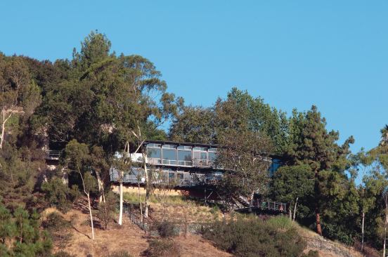 The architect doubled the size of the original 1,300-square-foot house by adding a full lower level. The new structure adheres to Pasadenas restrictive hillside ordinances and strict fire codes.