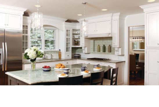 The designers at Normandy Builders wanted the island to have the look of a furniture piece to create an inviting space for family and friends to gather in this renovated Wilmette, Ill., kitchen. The judges found the color palette to be inviting and soothing. "The kitchen is tastefully done."