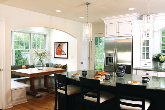 The banquette allows for a multi-functional space for eating, homework, or just enjoying company say the designers. Materials, colors, and finishes in the kitchen space will stand the test of time. 