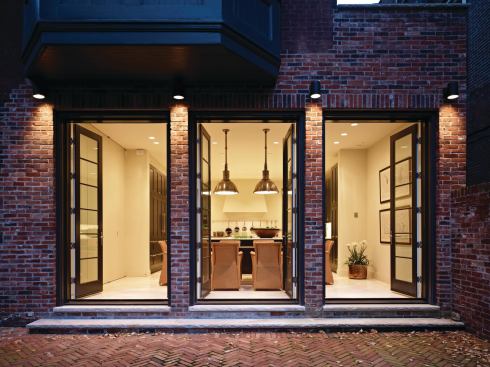 The homeowners are avid cooks who frequently entertain. Three large French doors provide easy flow for guests to the outdoor brick courtyard.