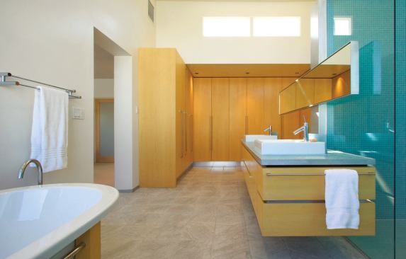 Part of the bath’s serene solution is ample storage.