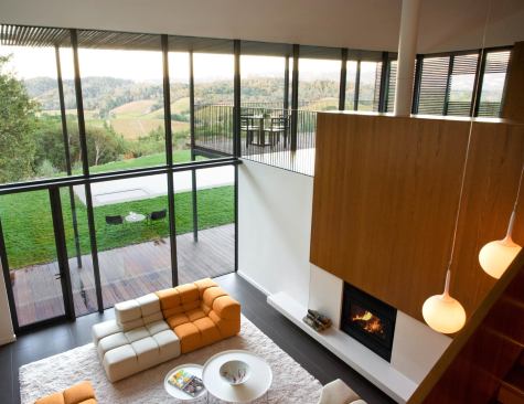 In pursuit of outdoor connection, the renovation removed substantial chunks of floor and exterior wall.

