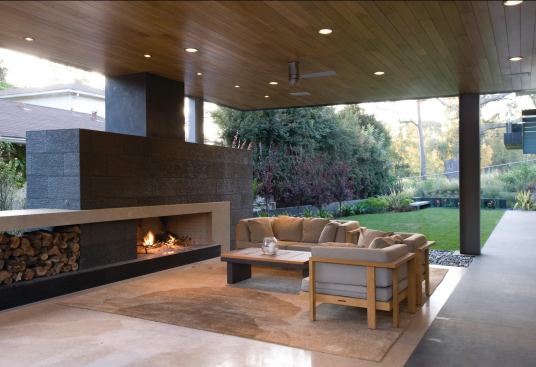 Pushing the house to the long side of the lot allows the outdoor spaces to flow.