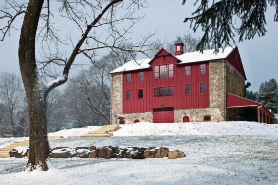 Sweetwater Farm Winery, Glen Mills, Pa. - Rear and Side Views

Grand Award - Accessory Building

Entrant/Architect: Peter Zimmerman Architects, Berwyn, Pa.

Builder: E.B. Mahoney Builders, Bryn Mawr, Pa.

Living space: 8,100 square feet

Site: 300-plus acres

Construction cost: Withheld

Photographer: Tom Crane.

 The architects kept as much of the 1743 barn's original stone walls as they could. The new portions are red-painted board-and-batten siding.