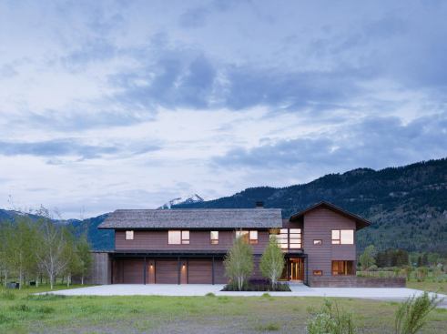 By placing the gabled roofs at the front of the house, Carney Logan Burke Architects helped the project fit into its traditionally-styled neighborhood.