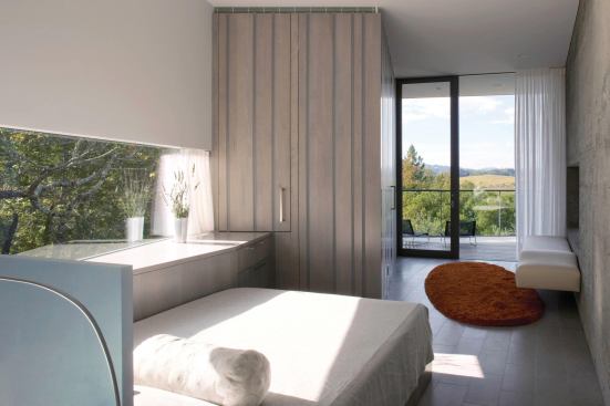 The bedroom. All interior millwork is oak with translucent acrylic inserts.

