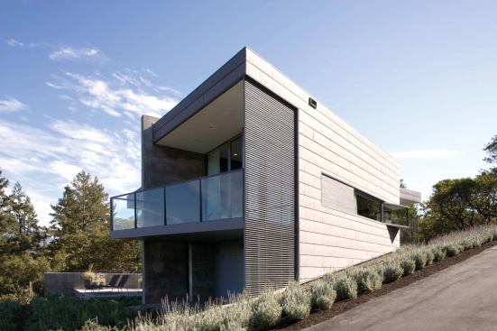 The house opens up on its downhill side.

