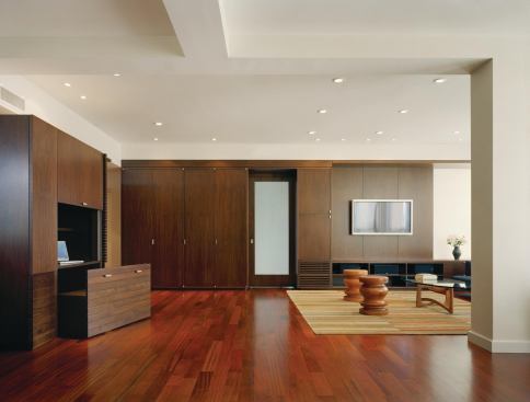 Walnut-stained casework brings texture and spatial definition to a New York City loft.