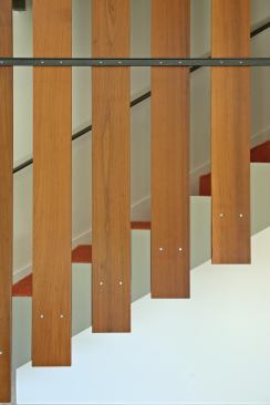 The home mixes warm wood detailing...