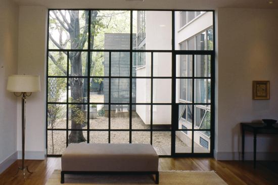 Big steel windows made in a local workshop bring in natural light.