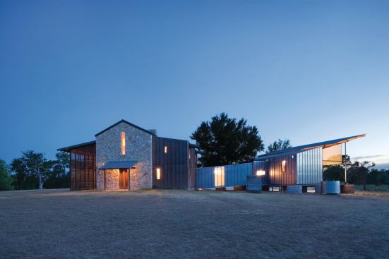 Sheet metal and wood battens clad the exteriors, while cork and fiber-cement boards form the interior finish materials.
