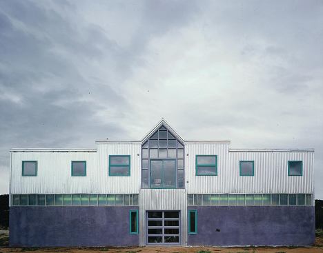 Teague chose metal siding materials for the way their appearance changes along with lighting conditions.