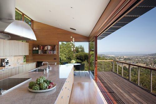 Anchored into the hillside at its north side, the slender living platform seems to go airborne toward the south.