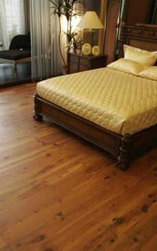 Olde Charleston Collection is the manufacturer’s new line of antique flooring that turns the clock back to 1670. The line of wide-plank flooring is made with a 3-milimeter-thick solid wood top layer and a solid birch bottom layer. It comes in three widths, including 7 1/2 inches, and 12 species such as True Reclaimed Heart Pine (shown), Wormy Chestnut, and Black Walnut. 
www.uafloors.com.