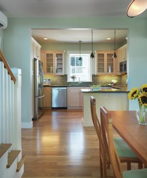 Kitchens are positioned on the more opaque north side, and living spaces spill out to the south.