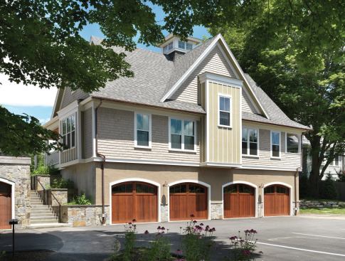 Two cottages incorporate garages accessed from the lower level.