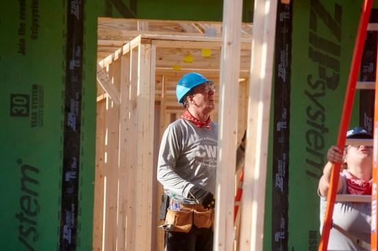 Jonathan Reckford, CEO of Habitat for Humanity International, helps build a home in Charlotte, North Carolina. Like other builders, the nonprofit is trying to figure out how to build more affordable housing amid rising costs and other challenges, he says.