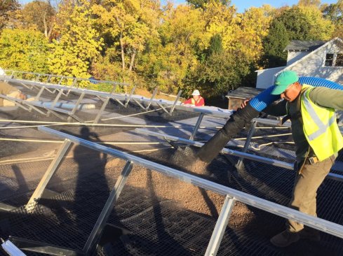 The blower truck allows media to be spread across the roof without creating any point loads.