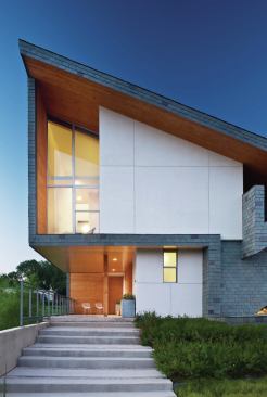 Architect Vincent Snyder chose to clad the Urban Reserve house in slate for several reasons. It is low-maintenance, durable, and can last as long as 300 years if installed correctly, he says. Also, by using it on both the roof and walls it provided a seamless, sculptural look.