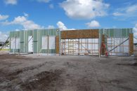 Panelized construction techniques reduce labor demands.